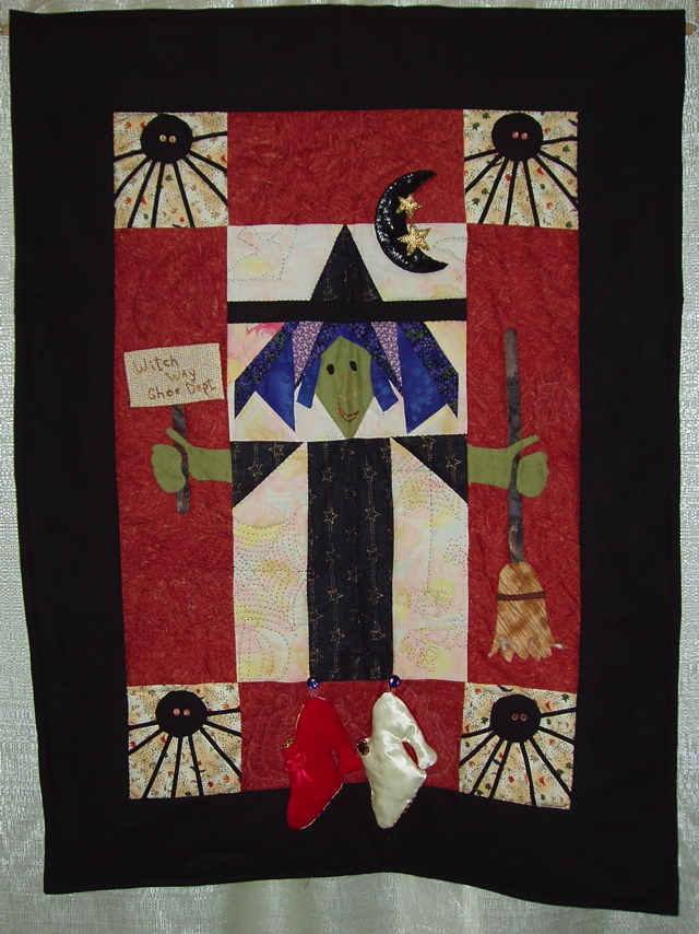 E 26 A Margaret Kocimski - Witch Way Shoe Dept.